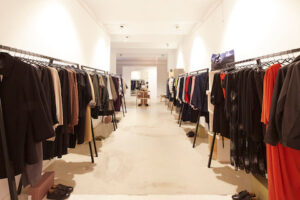 Modern plus size fashion boutique interior in Germany with extended size clothing display